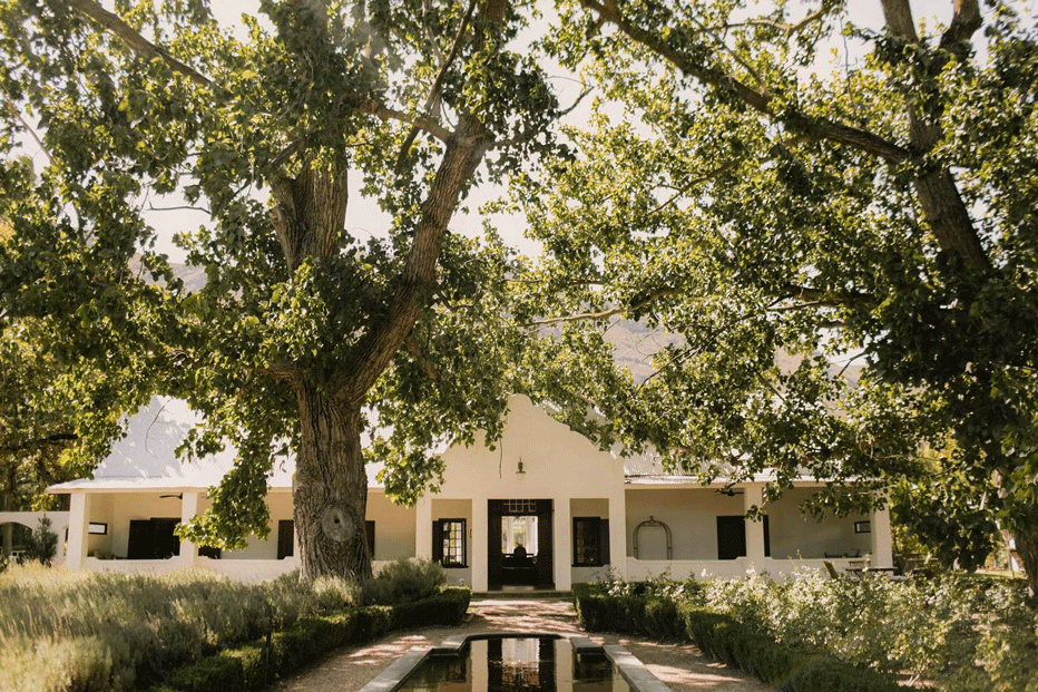 Luxury Event Venues La Paris modern luxury event space with elegant tables and chandeliers in Cape Town.