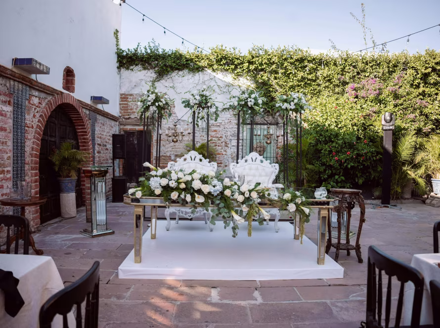 Eco-conscious outdoor event setup with natural greenery and sustainable décor.