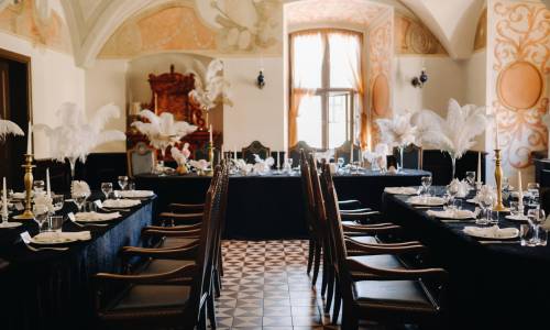 decorated festive table for a wedding evening in an old castle.